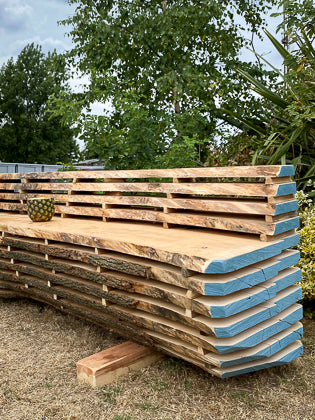 Bench made from air drying timber at Fosters Estate Hendon London