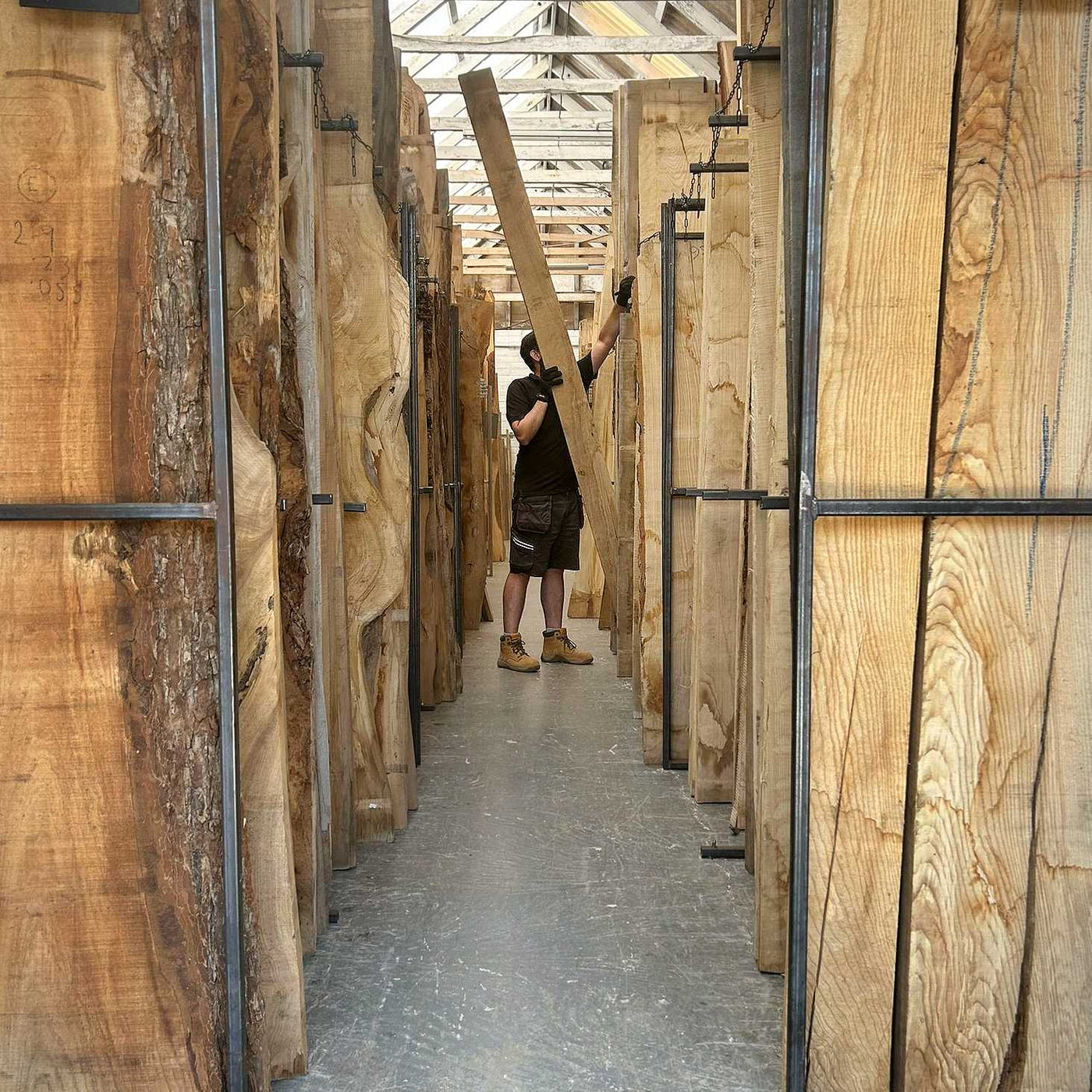 Browsing hardwood timber boards at an Essex timber warehouse