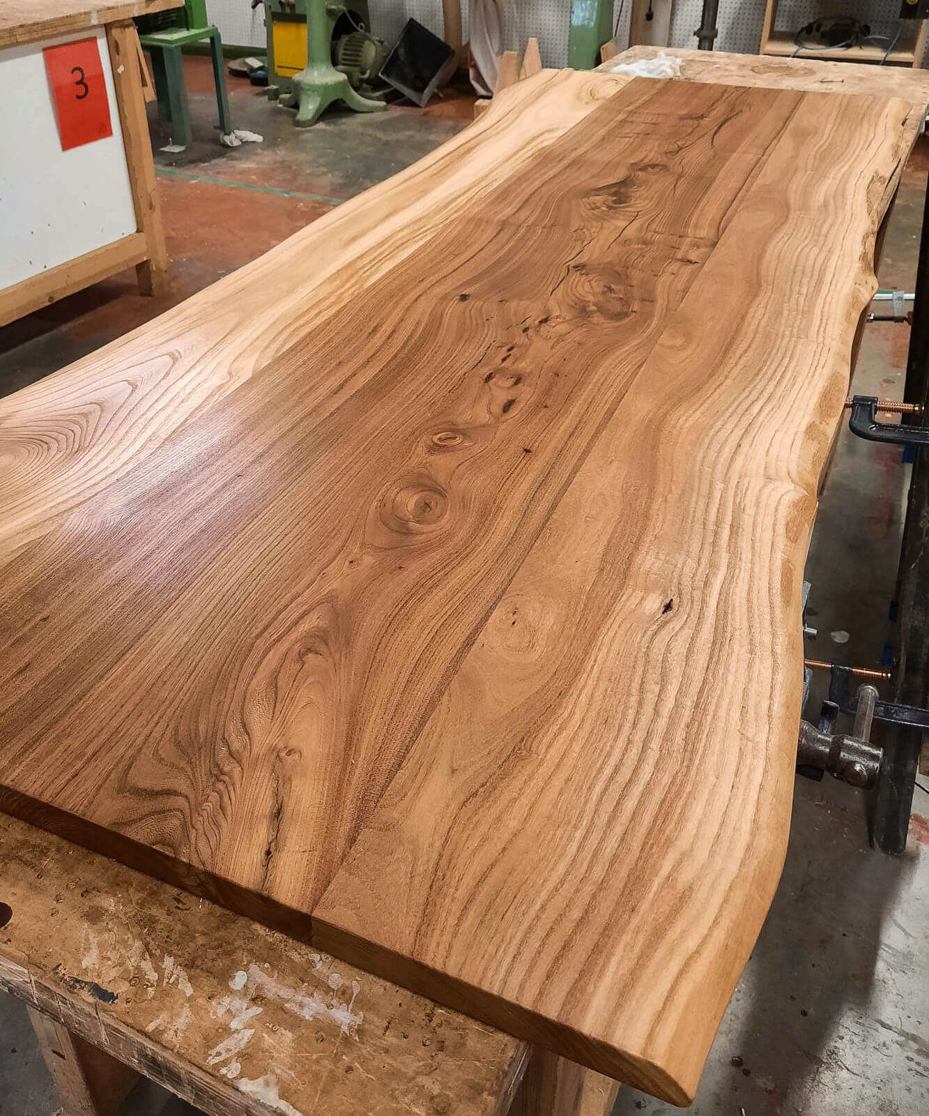 Handmade elm table with waney edge