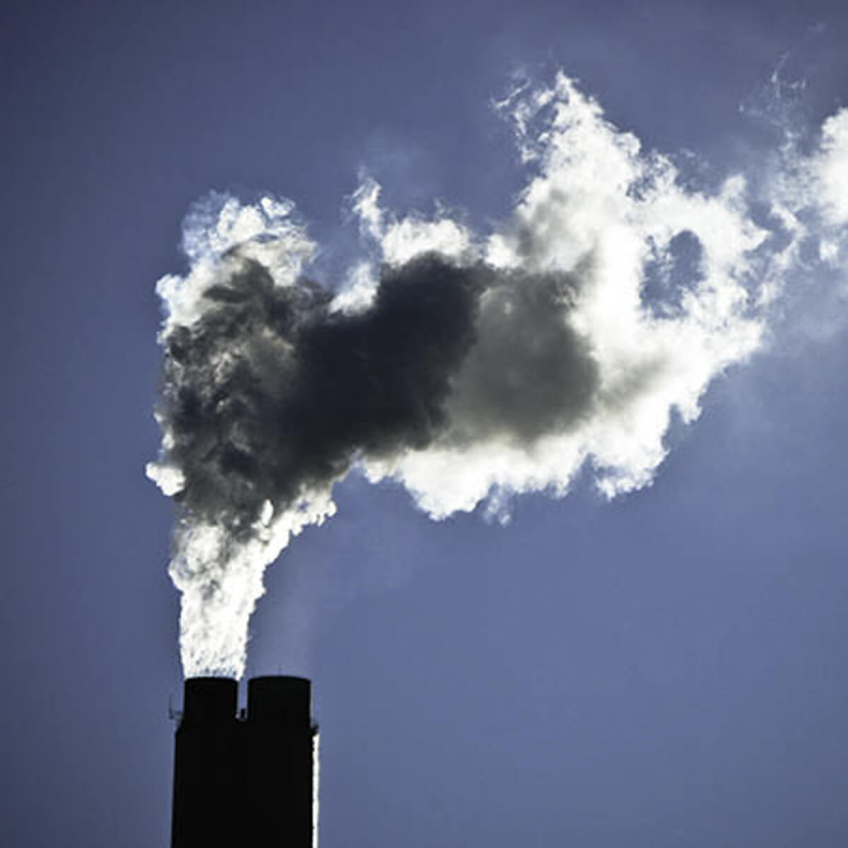 Chimney releasing smoke
